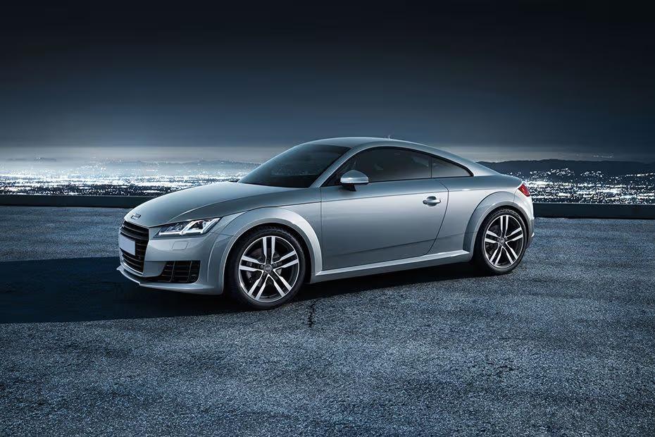Audi TT Coupe 2026 front left side angle view on city street Audi TT Coupe 2026 front left side angle view on city street