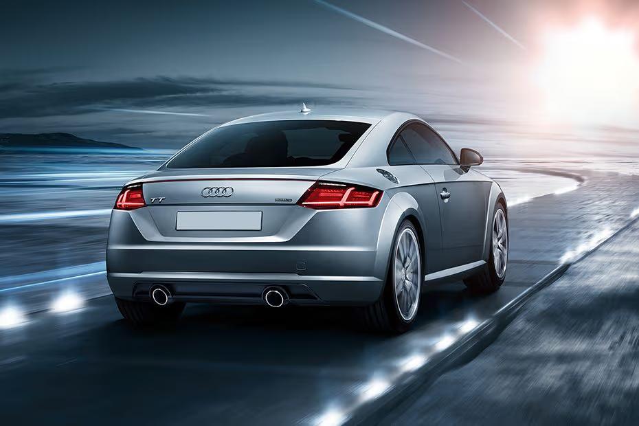 Audi TT Coupe 2026 Rear Right side angle view showing taillights Audi TT Coupe 2026 Rear Right side angle view showing taillights