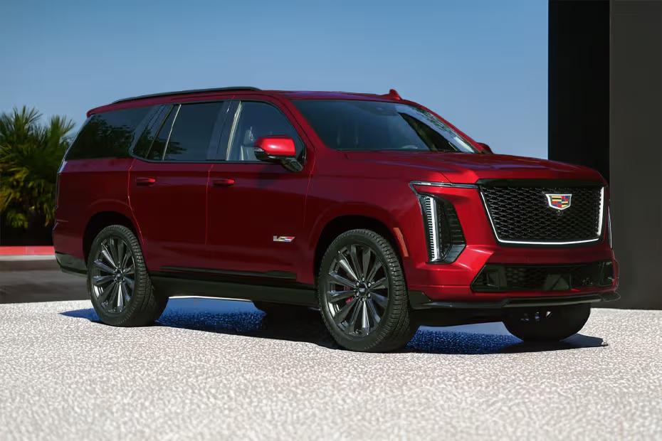 Cadillac Escalade V 2026 Front Left Side Angle View on City Street Cadillac Escalade V 2026 Front Left Side Angle View on City Street