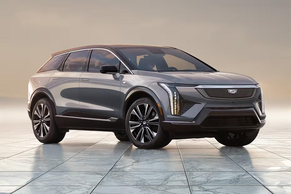 Cadillac Optiq 2025 Front left side angle view highlighting the side profile Cadillac Optiq 2025 Front left side angle view highlighting the side profile