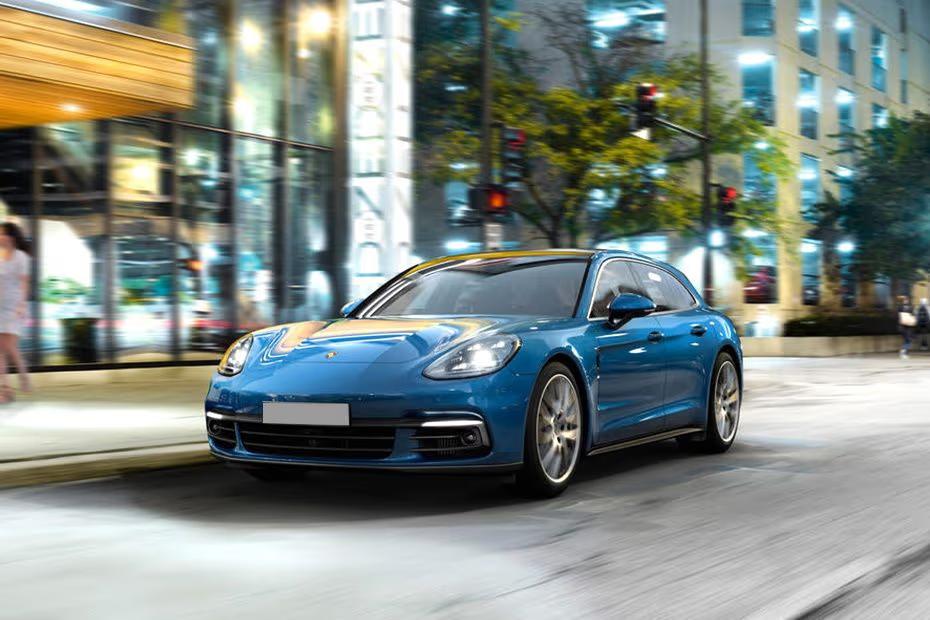 Porsche Panamera 2026 Front Right Side Angle View on City Street Porsche Panamera 2026 Front Right Side Angle View on City Street