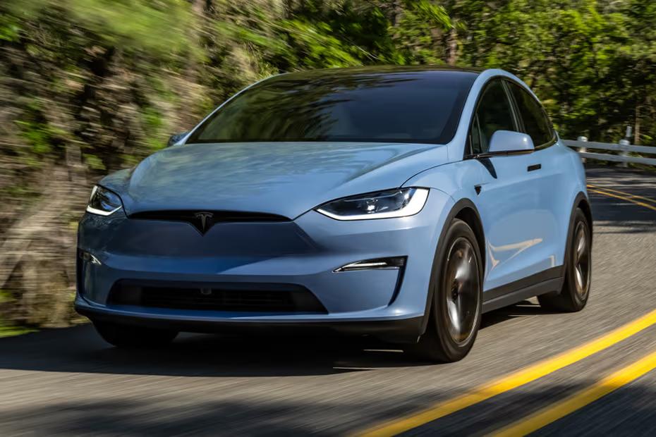 Tesla Model X 2026 Front Left Side Angle View on City Street Tesla Model X 2026 Front Left Side Angle View on City Street