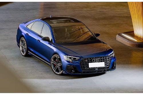 Audi S8 Blue Sedan front right side angle view on city street Audi S8 Blue Sedan front right side angle view on city street