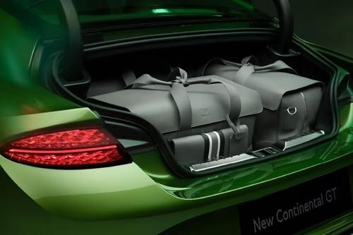 Bentley Continental GT 2026 Coupe rear profile showing the open boot space Bentley Continental GT 2026 Coupe rear profile showing the open boot space