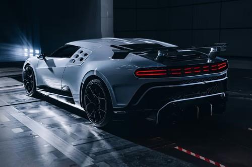 Bugatti Centodieci White Coupe Rear Left side angle view showing taillights, tailgate and alloy wheels Bugatti Centodieci White Coupe Rear Left side angle view showing taillights, tailgate and alloy wheels