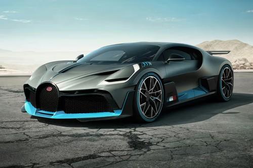 Bugatti Divo Black Sportscar right side angle view on city street Bugatti Divo Black Sportscar right side angle view on city street