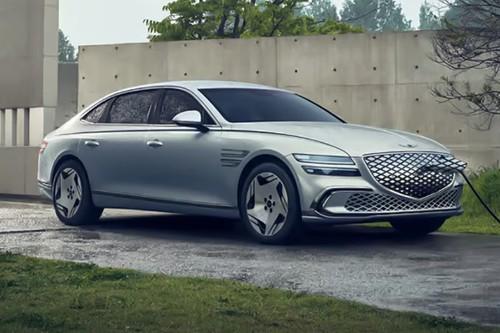 Genesis EV G 80 Uyuni White Sedan front right side angle view Genesis EV G 80 Uyuni White Sedan front right side angle view