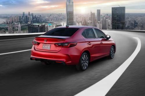 Honda City 2026 Sedan Rear Right Side View Showing Taillights and Alloy Wheels Honda City 2026 Sedan Rear Right Side View Showing Taillights and Alloy Wheels