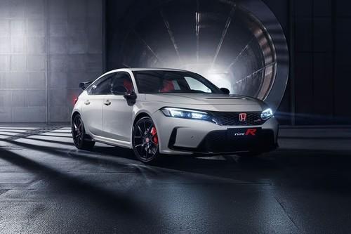 Honda Civic Type R Hatchback Front left angle showcasing the front bumper, grille, and side profile Honda Civic Type R Hatchback Front left angle showcasing the front bumper, grille, and side profile