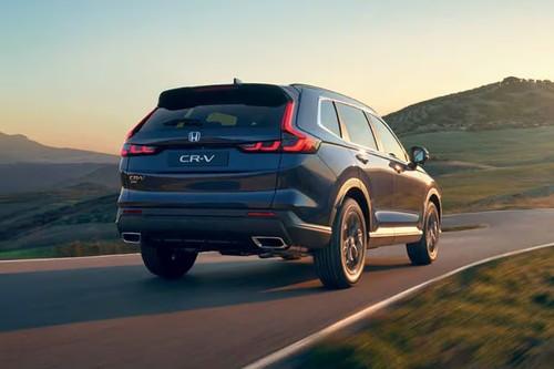 Honda CR-V 2026 SUV Rear right side angle view showing the taillights Honda CR-V 2026 SUV Rear right side angle view showing the taillights