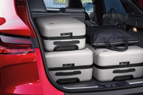 Infiniti QX55 2026 Coupe exterior rear profile showing the open boot space Infiniti QX55 2026 Coupe exterior rear profile showing the open boot space