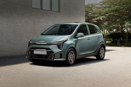 Kia Picanto 2026 Hatchback front right side angle view on city street Kia Picanto 2026 Hatchback front right side angle view on city street