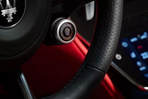 Maserati GranCabrio Coupe interior ignition start-stop button close-up Maserati GranCabrio Coupe interior ignition start-stop button close-up