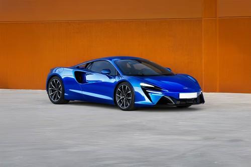 McLaren Artura 2026 Blue Coupe front right side angle view McLaren Artura 2026 Blue Coupe front right side angle view