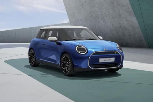 Mini Cooper Electric SUV Front Left Side Angle View on City Street Mini Cooper Electric SUV Front Left Side Angle View on City Street