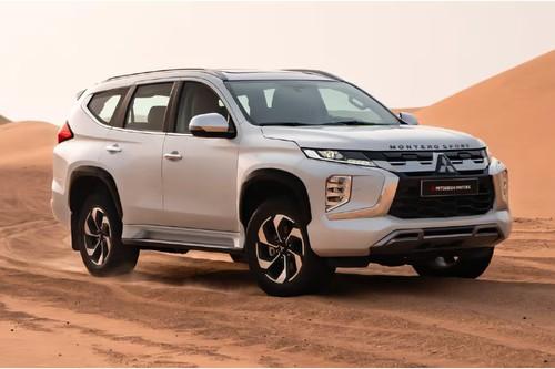 Mitsubishi Montero Sport 2026 SUV Front left side angle view showing front grille, headlight and alloy wheels Mitsubishi Montero Sport 2026 SUV Front left side angle view showing front grille, headlight and alloy wheels