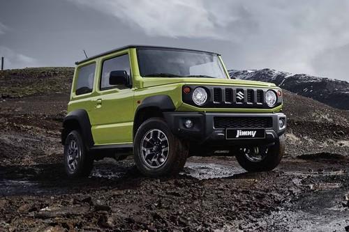 Suzuki Jimny 2025 Giallo Modena SUV Front Left Side Showing Front Grille and Alloy Wheels Suzuki Jimny 2025 Giallo Modena SUV Front Left Side Showing Front Grille and Alloy Wheels