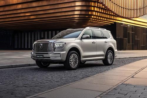 Tank 500 SUV front right side angle view on city street Tank 500 SUV front right side angle view on city street